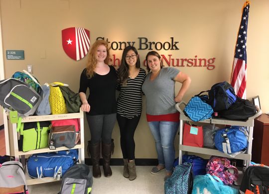 Stony Brook University Student Nurses Association donates duffle bags to EAC Network