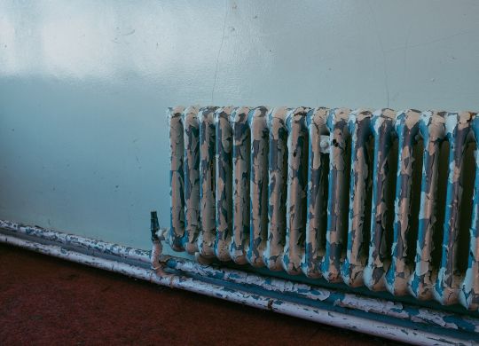A worn out radiator in need of repair.
