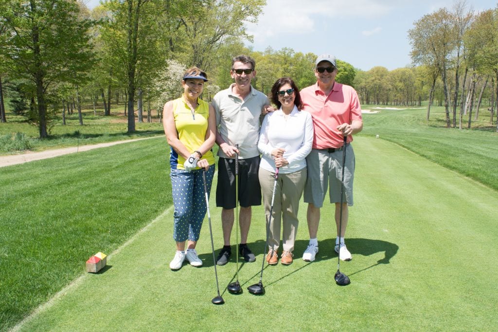 A foursome on the tee at EAC Network's 2018 Golf for Good event.