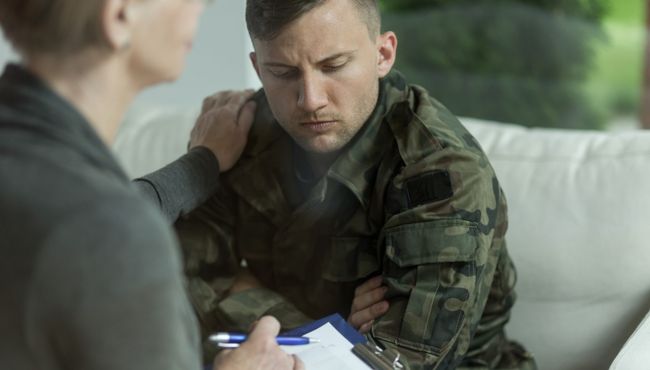 Veteran speaking to a counselor